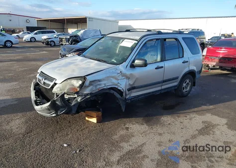 2004 Honda Cr-V Lx z USA, uszkodzony, nr VIN JHLRD68404C008306